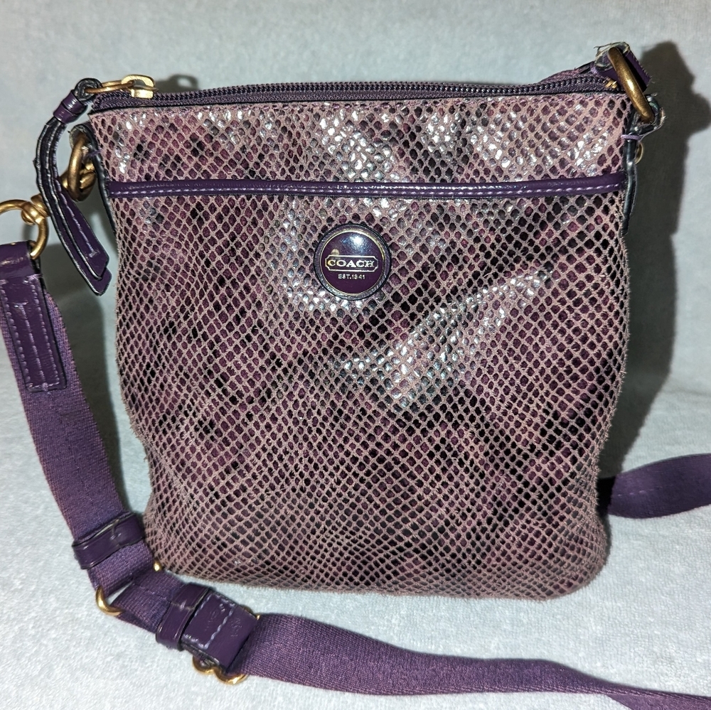 Coach purple exotic snakeskin swingpack crossbody bag.F 50116.